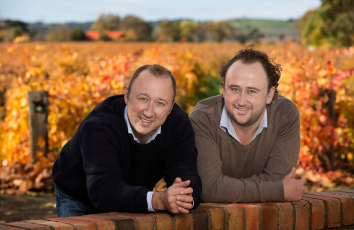 Elderton – Cameron-and-Allister-with-the-Command-vineyard-in-autumn-300dpi
